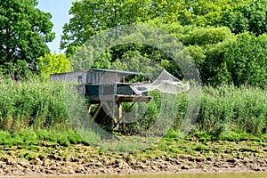 Fishing shelter on the Garonne in France photo