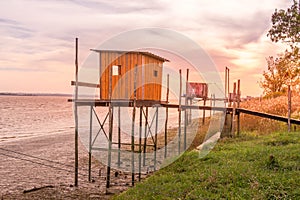 fishing shelter in the harbor of Saint-julien-Beycheville, Gironda river France photo