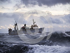 Fishing ship in strong storm.