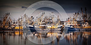 Fishing ships during majestic sunset