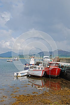 Fishing ships moored on quay