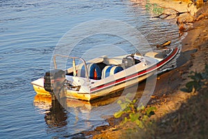 Fishing speed boat moored on the bank of the zambezi river