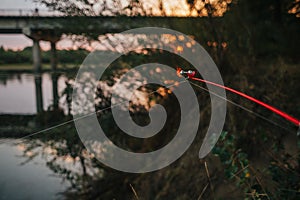 Fishing spinning.bell. blue water