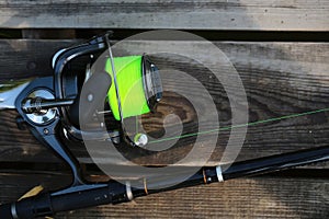 Fishing spinning rod and reel photo