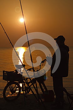 Fishing at sunrise.
