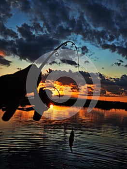 Fishing at sunset