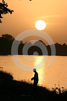 Fishing at sunset