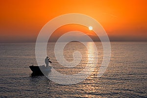 Fishing at sunset