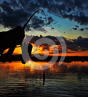 Fishing at sunset photo