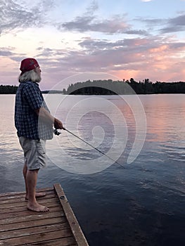 Fishing at sunset, Lake of the Woods, Kenora, Ontario