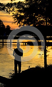 Fishing sunset silhouette