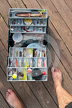 Fishing Tackle Box On a Dock