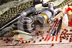 Fishing tackle on a wooden table.