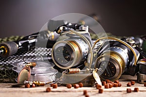 Fishing tackle on a wooden table.