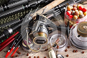 Fishing tackle on a wooden table.