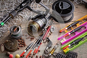 Fishing tackle on a wooden table.