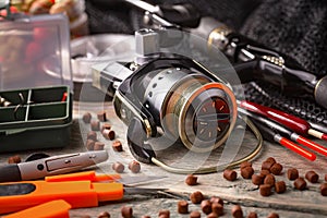 Fishing tackle on a wooden table.