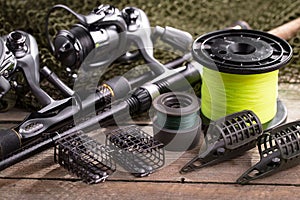 Fishing tackle on a wooden table.