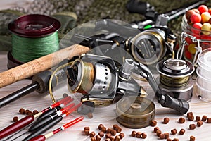 Fishing tackle on a wooden table.