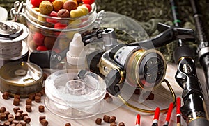 Fishing tackle on a wooden table.