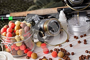 Fishing tackle on a wooden table.