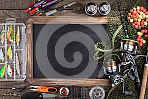 Fishing tackle on a wooden table.