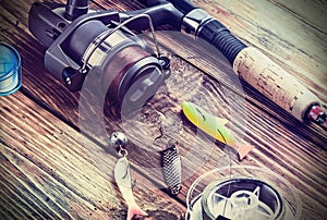 Fishing tackle on a wooden table