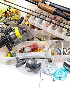 Fishing tackles - rod, reel, line and lures in box