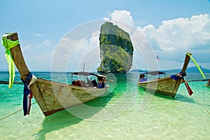 Fishing thai boats and landmark at Poda island