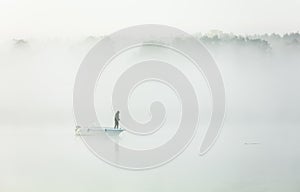 Fishing in a thick morning fog