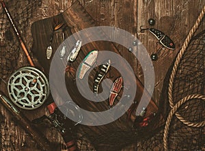 Fishing tools on a wooden table