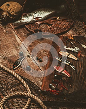 Fishing tools on a wooden table