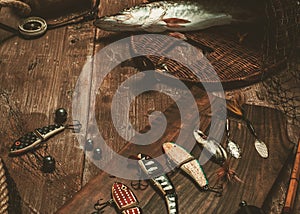 Fishing tools on a wooden table