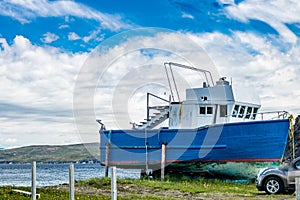 Fishing vessels sitting on the beach. Route 450 Newfoundland Canada