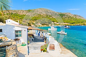 Fishing village buildings on beautiful coast of Samos island at Posidonio bay, Greece