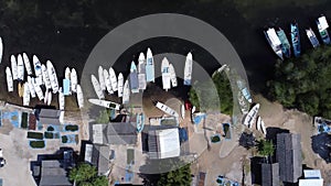 A fishing village in Junggutbatu Village, Nusa Lembongan, Bali as seen by drone from an aerial view. the white sand, traditional