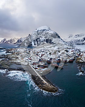 Fishing Village A, Rorbu, Sea and Mountains in Winter. Moskenes, Lofoten Islands. Landscape of Norway. Aerial View photo