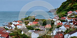 Fishing village by the sea in the style of impressionist painting ai Generated, generative AI, CGI graphics