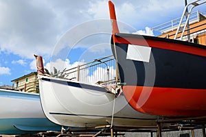 Fishing wooden boat moored on the beach