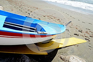 Fishing wooden boat moored on the beach