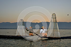 Fishman and net in Canoe