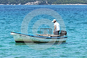 Men in boat fishing, Adriatic sea, Croatia