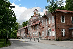 Old brick building with a tower clock