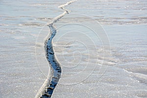 Fissure on the ice photo