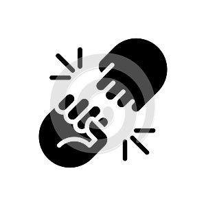 Fist bump sign black glyph icon