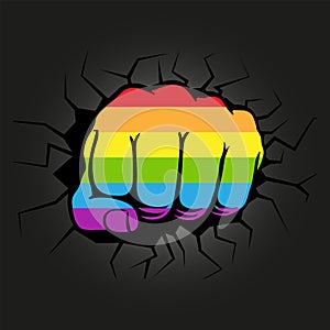 Fist in the colors of LGBT smashes a black background