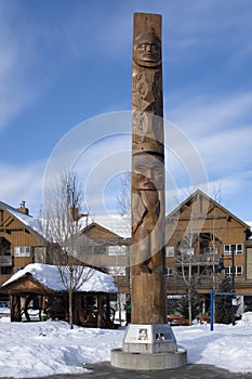 Olympic lightning welcome figure wooden carving in Whistler village