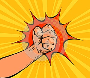 Fist punching, crushing blow or strong punch drawn in pop art retro comic style. Cartoon vector illustration photo