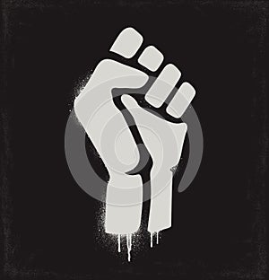 Fist raised in protest. Fist icon isolated on a dark background. Vector illustration