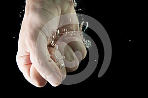 Fist with water and splash.